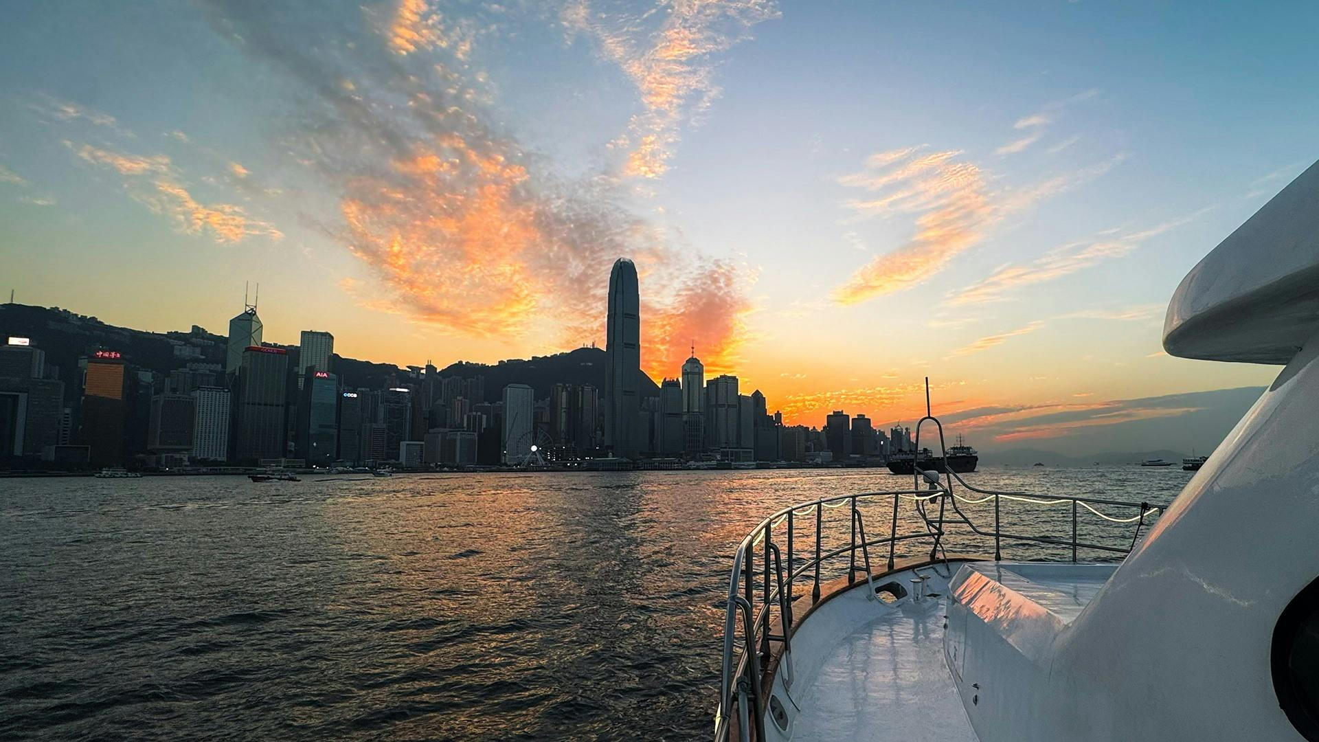 Victoria Harbour: 1-Hr Night Cruise Dreamer with Unlimited Snacks + Drinks - Photo 1 of 3